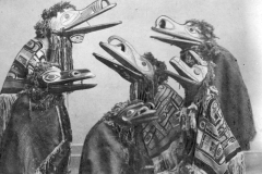 Bella-Coola-Native-Canadians-in-their-bird-mask-ceremonial-outfits-late-1800s-Vancouver-scaled